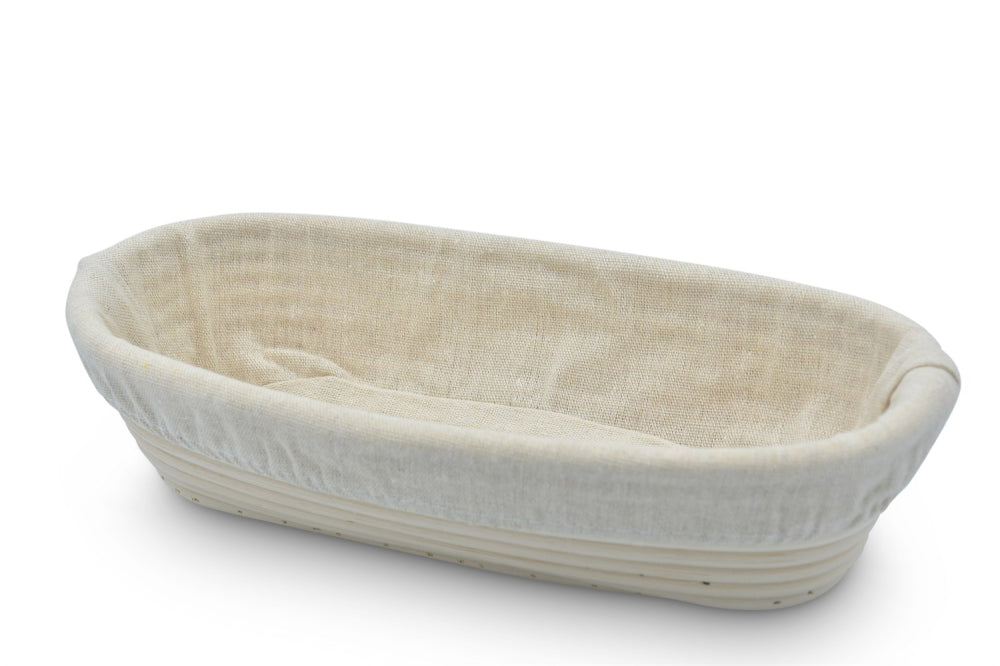 Oval jäskorg 30 x 14 cm i rattan, med avtagbart tyg
